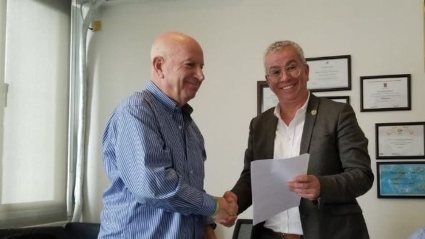 פרופ' עקיבא פרדקין במעמד חתימת הסכם עם האוניברסיטה האמריקאית של קפריסין